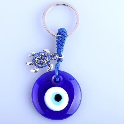 China Religious Evil Eye Key Chain Fashion Jewelry Alloy Ring With Turtle Shape Girls Women Pendant Gift for sale