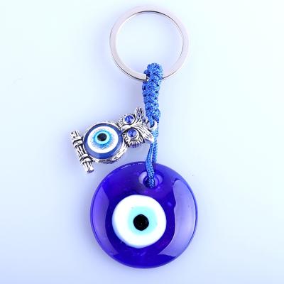 China Religious Car Ring Alloy Glass Ring Blue Owl Evil Eye Keychain of 2021 newest jewelry blue stones for sale