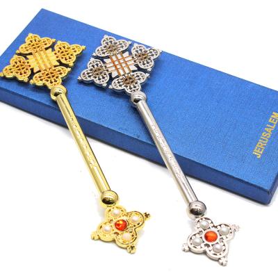 China Religious Factory Selling Hot Selling Metal With Socket Hand Style Religious Box Prayer Coptic And Ethiopian Cross for sale