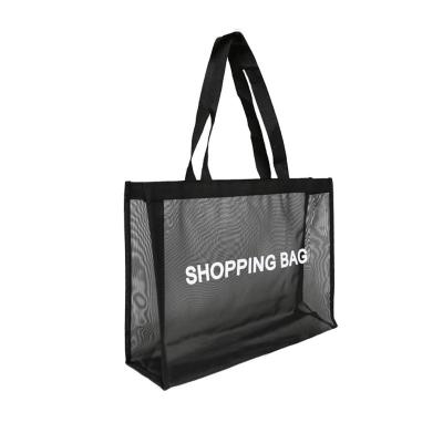 China Hot Selling Mesh Shopping Bag Large Capacity Mesh Bag Supermarket Storage Beach Bag Handled Transparent Nylon Handbag for sale