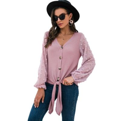 China Hot Selling Anti-wrinkle Knot Button Solid V-neck Stitching Transparent Sleeve Sexy Women's Long Sleeve Blouse for sale