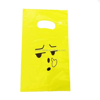 China Recyclable Cute Gift Bag Small Yellow Plastic Die Cut Goods Glossy Bag for sale