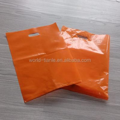 China Safety 100% Recyclable Thick Orange Plastic Die Cut Shopping Bags 1.25 Mil for sale