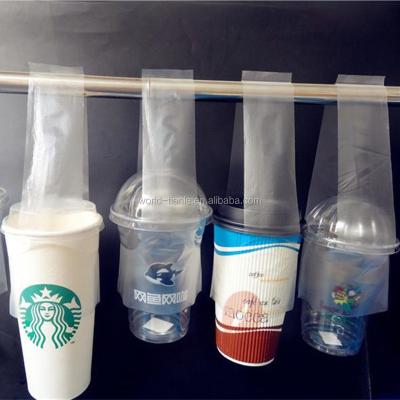 China Disposable Transparent Line Plastic Disposable Coffee Cup Handle Bags for sale