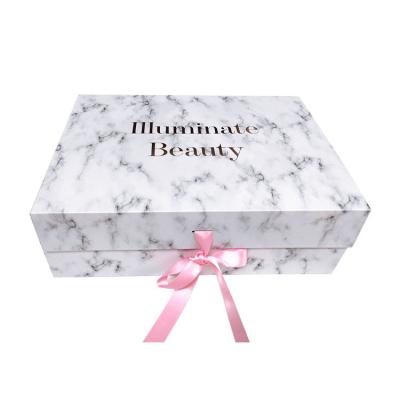 China Recycled Materials Latest Design Customized Rigid Magnetic White Marble Flip Closure Hair Gift Boxes Flat Pack Cardboard Folding Box With Ribbon for sale