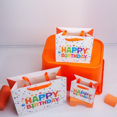 China Recyclable Customized Logo  Glossy 3D Pringting Kids Children Gist Package Birthday Cake Gift paper Bag for sale