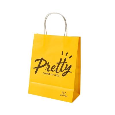 China Recycled Materials Manufacturer Wholesale Custom Logo Printed Brown Kraft Paper Bags With Flat Handle for sale