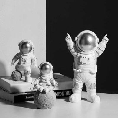 China Modern Europe Statue Spaceman Astronaut Figurine Living Room Wine Cabinet TV Cabinet Kids Room Furnishing Decorations for sale