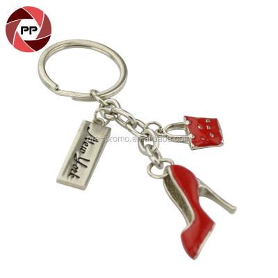 China Custom Wholesale Metal Souvenir Metal High Heel Key Chain With Handbag for sale