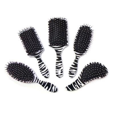 China Professional Wet Paddle Care Hair Brush Detangling Hair Brush 4C Synthetic Hair Detangler for sale