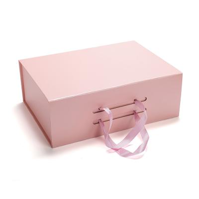 China Large Colorful Ribbon Decoration Boutique Recyclable Customized Packaging Gift Boxes for sale