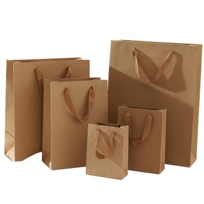 China New Listing Reused Materials Custom Design Your Logo Personalized Kraft Paper Bags For Sale for sale