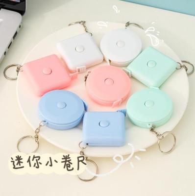 China ABS & Custom Mini Pink Round Plastic 1.5M PVC Key Chain Portable Retractable Tape Measure for sale