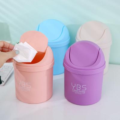 China Creative Plastic Desk Organizer Viable Car Waste Bin Mini Trash Can Rolling Cover Desktop Design for sale