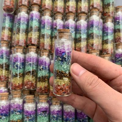 China Stone Healing Seven Chakras Crystal Rolling Stone Wishing Bottle high quality colorful quartz wholesale from China for sale