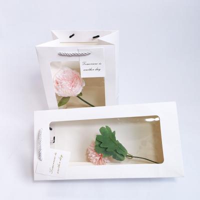 China Offset Printing Clear Window Ivory Board Carrier Gift Packaging Recyclable Wholesale Paper Bag for sale