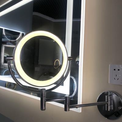 China Round Shape Hotel Bathroom Vanity Magnifying Shower Folding LED Double Sides Magnifying Wall Mounted Mirror for sale