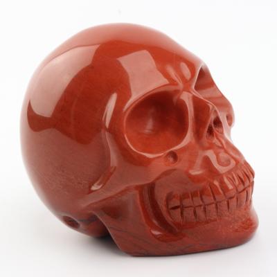 China Europe Wholesale Nature Carved Crystal Skulls Healing Crystal Red Jasper Skulls for Decoration for sale