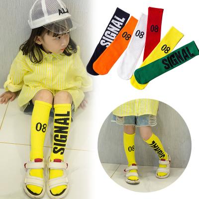 China New Breathable Kids Stockings Candy Color Knitted Girls Autumn Socks Cotton Sports Knee High Socks for sale