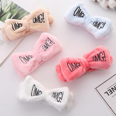 China Durable Wholesales Girls Cute Face Wash Plush Headband OH GOD Letters MES Bow Coral Fleece Headband for sale