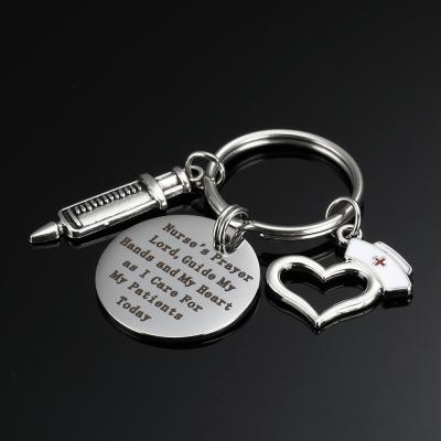 China 304 Stainless Steel Metal Key Chain Nurse's Prayer Hat Syringe Doctor Nurse's Day Gift Stain for sale