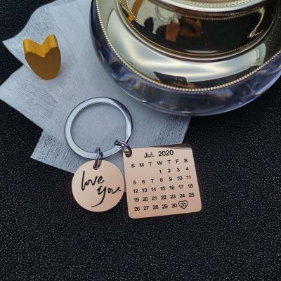 China Unique Wedding Anniversary Christmas Gift Engraved Personalized Calendar Key Chain for sale