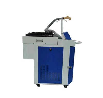 China Newest Design PVC 1500w Handheld Fiber Portable Laser Derusting Cleaning Machine For Building Material Shops for sale