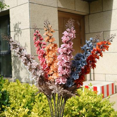 China Countryside Wholesale Artificial Plants Grass Plastic Artificial Flower Wedding Decorative Leaves Home for sale