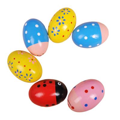 China Music Game Shaker Sand Hammer Instrument Early Baby Egg Solid Color Learning Toy Wooden Sand Egg for sale