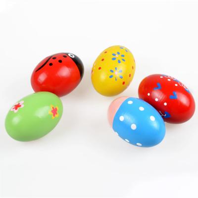 China Hot Sale Baby Toddler Musical Instrument Egg Sand Color Toy Wooden Sand Egg Early Education Game for sale