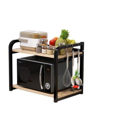 China Wooden Steel Microwave Oven Storage Shelf Stand Custom Logo Kitchenware Storage Rack High Quality Viable Kitchen Black for sale