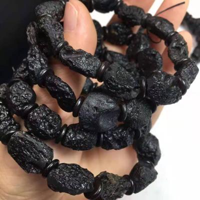 China Environmental Protection Wholesale Natural Crystal Brace Lace Tektite Stone Bangle Polished Crystal Bracelet for sale