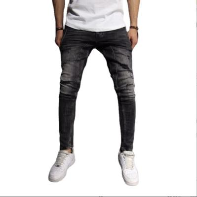 China Breathable Mens Jeans OEM Fit Ripper Washing Stacked Fit Mens Jeans Ripped Top Design Custom Jeans for sale