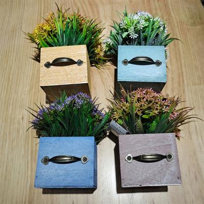 China Beautiful colorful artificial flower wooden box wedding background photo props home office aquatic plant decoration simulation plants for sale