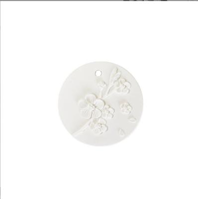 China Hanging Flowers Car Aromatherapy Gypsum Fragrance Essential Oil Pendant Diffuser Scented Ceramic Aroma Stone for sale