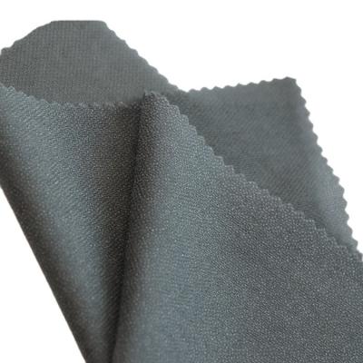 China Adhesive High Quality Polyester Materials Woven 100% Fusible Interlining Fabric for sale