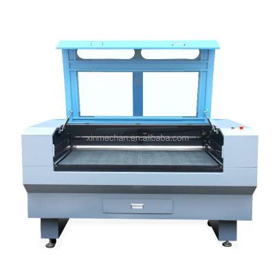 China Laser CUTTING CO2 laser mark cut engrave machine for acrylic fabric etc. pvc paper tissue leather for sale