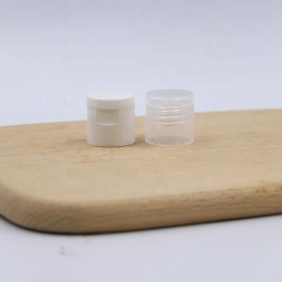 China Non refillable in cheap price 20/410 white stock flip top cap plastic shampoo capsule for sale