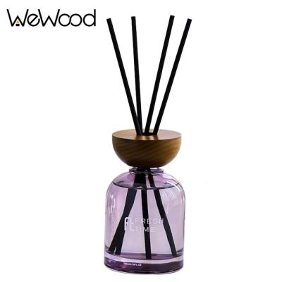 China Fashionalbe Home Hotel Essential Oil Clear Glass Aroma Reed Diffuser Luxury Scenting With Wooden Cap for sale