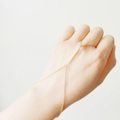 China TRENDY Danity 18k Gold Stainless Steel Chain Link Bracelet Freshwater Beads Seedbead Slave Hand Chain for sale