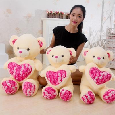 China Promotion & gifts love heart teddy bear wedding gift plush toys stuffed teddy bear with heart shape pillow for sale