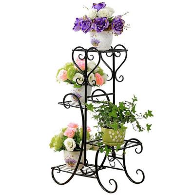 China CLASSIC Design Black Metal Flower Stand Compact Size Flower Holder Plant Stand Classic Attractive Home Decor Floral Stand for sale