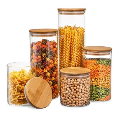 China Freshness Keeping Supplier Wide Mouth Round Airtight Food Spice Tea Pasta Borosilicate Kitchen Storage Jar Glass Containers With Wooden Bamboo Lid for sale