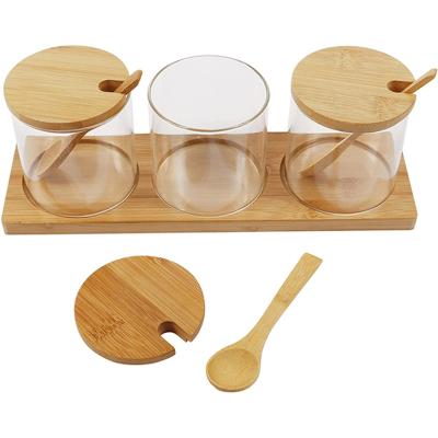 China Freshness Preservation 3 Pcs Clear Glass Jars With Lid Bamboo Spoon Holder Bamboo Canister Storage Containers For Spices Seasoning Sugar Salt for sale