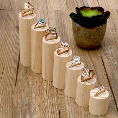 China New Wooden Lot of 7 Ring Display Holder Wood Jewelry Ring Showcase Ring Display Stand for sale