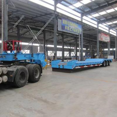 China 2180mm Tread Steel 2 Axles Lowbed Semi Trailer with Hydraulic Rear Ladder Competitive for sale