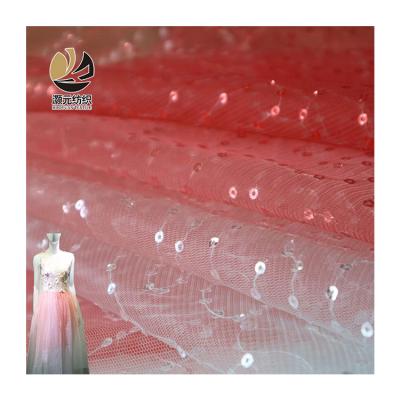 China 100%Polyester Sequin Tulle Fabric Lady Dress Girl Dress Anti-static Shiny Embroidery Tulle Fabric Costume Fabric for sale