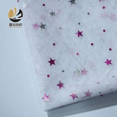 China Viable Hot Selling Soft Beautiful Cheap Star Foil White Textile Tulle Fabric For Dress for sale