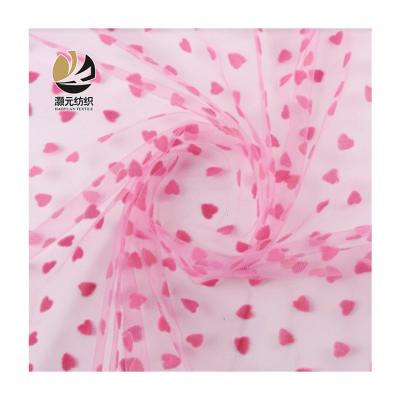 China Other China Manufacturer Design High Quality Fancy Pink Soft Tulle Heart Flocked Mesh Fabric For Dress for sale