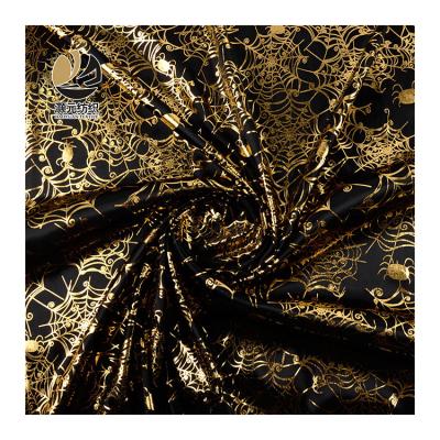 China Other Customized Gold Shiny Printed Knitting Tan Fabric With Spider Web Pattern Shiny Gold Fabric for sale